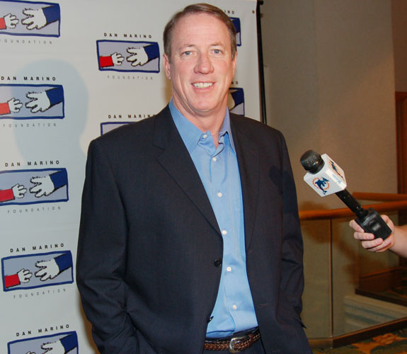 Former Buffalo Bills and UM quarterback Jim Kelly smiles for cameras at the Marino Foundation Charity Dinner at the Loews Hotel on Miami Beach, Fla.