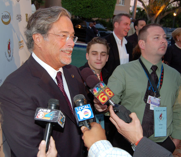 Miami Heat managing general partner Micky Arison addresses the local media before a team benefit at the home of Shaquille O'Neal on Star Island.