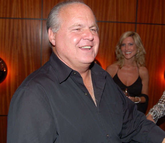 Conservative talk radio host Rush Limbaugh engages the local media on the red carpet at a Miami Beach fundraiser for his attorney Roy Black.