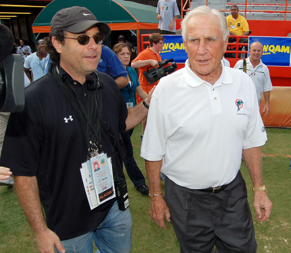 Former Miami Dolphins coach Don Shula walks onto the Orange Bowl field for the final time at the stadium's closing ceremonies.