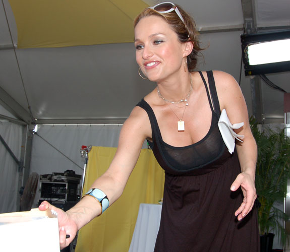 Celebrity chef Giada De Laurentiis signs autographs for fans during the South Beach Wine & Food Festival Grand Tasting.