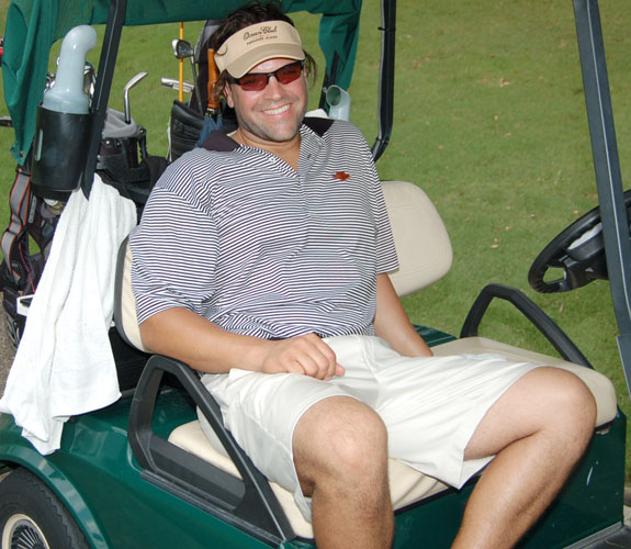 Ex-Major League catcher Mike Piazza takes a break from the links during Jason Taylor's celebrity golf event at Grande Oaks in Davie, Fla.