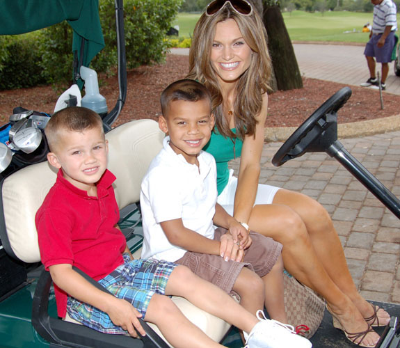 Katina Taylor with her twin sons, Mason, left, and Isiah, right, at the Jason Taylor celebrity golf event at Grande Oaks in Davie, Fla.