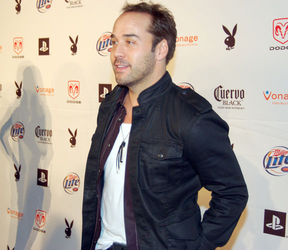 Actor Jeremy Piven mugs for photos on the red carpet at the Playboy Magazine Super Bowl XLI Party at the AmericanAirlines Arena.