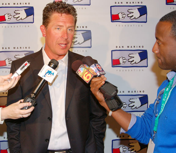 WSVN sports anchor Donovan Campbell interviews Dan Marino at the former quarterback's charity dinner at the Loews Hotel on Miami Beach, Fla.