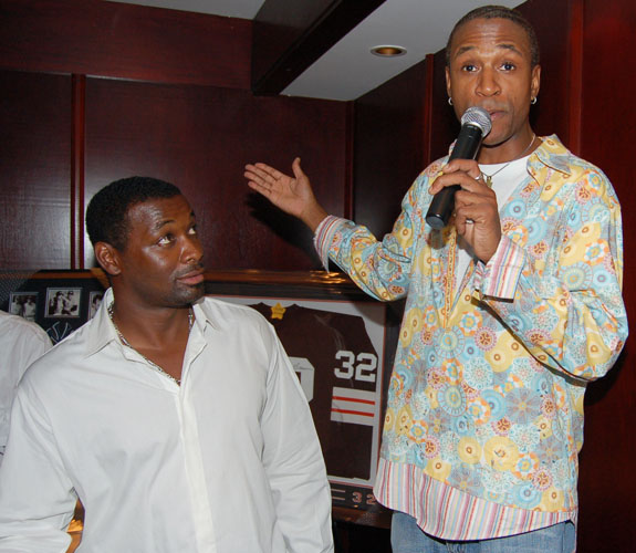 Ex-NFL running back Terry Kirby and comedian Tommy Davidson addressing guests at Morton's Steakhouse in North Miami Beach.