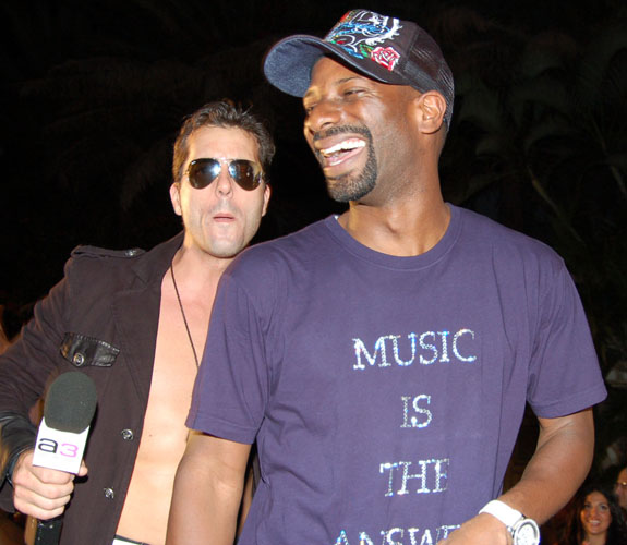 Ian Grocher, a.k.a. DJ Irie, on a makeshift runway during Fashion Art Ball at the former Versace Mansion on South Beach.