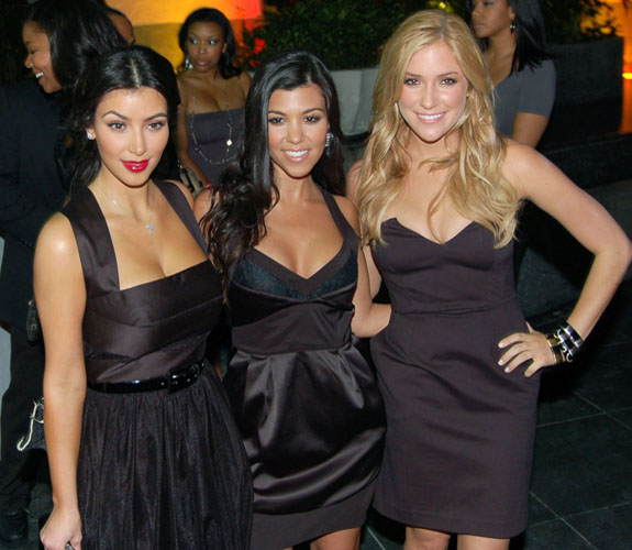 Kim Kardashian, Kourtney Kardashian, and Kristin Cavallari on the red carpet en route to the Fontainebleau Resort's grand re-opening party on Miami Beach.